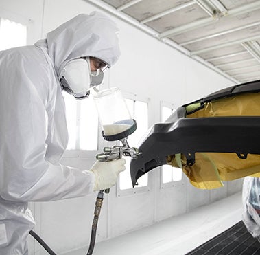 Collision Center Technician Painting a Vehicle | Toyota Vallejo in Vallejo CA
