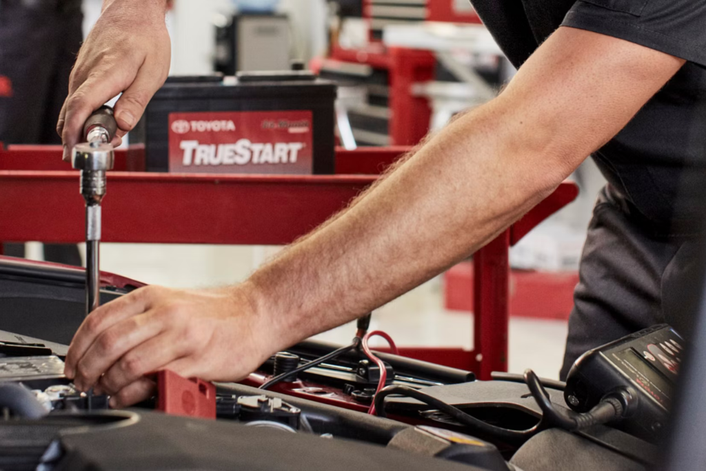 Toyota Vallejo technician installing a TrueStart battery during vehicle service.