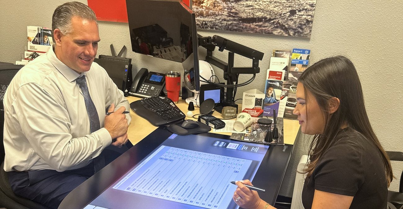 Toyota Vallejo team member reviewing appraisal details with a customer